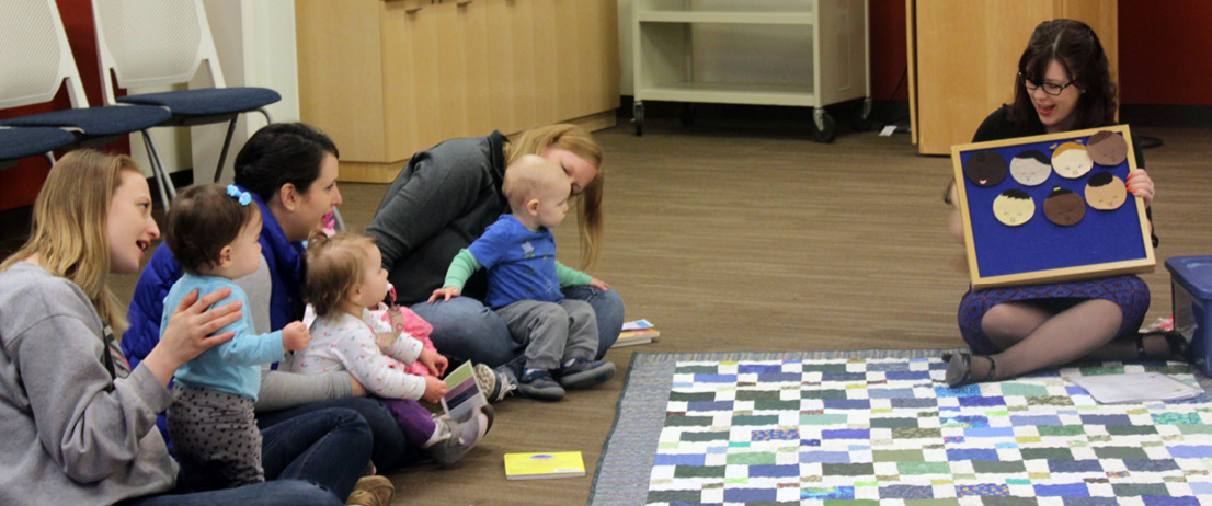 Anna Haase Krueger sings “Ten Little Darling Babies” at Baby and Me storytime