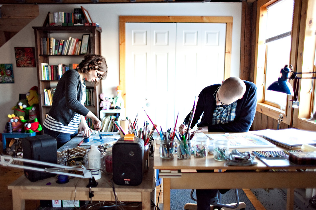 The Steads working in their home studio.
