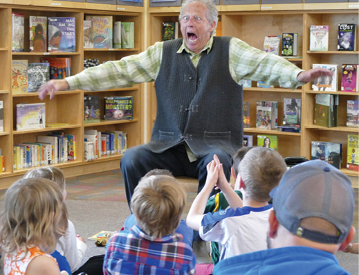 The author really gets into his storytelling! Here he is doing a performance at the Homer (AK) Public Library during Summer Reading Program 2019.