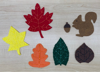 Felt flannel board activities featured ladybugs, houses, and leaves.