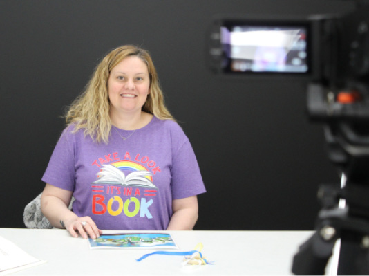 Children’s Librarian Kylie Coy is ready to begin her interactive Zoom storytime.