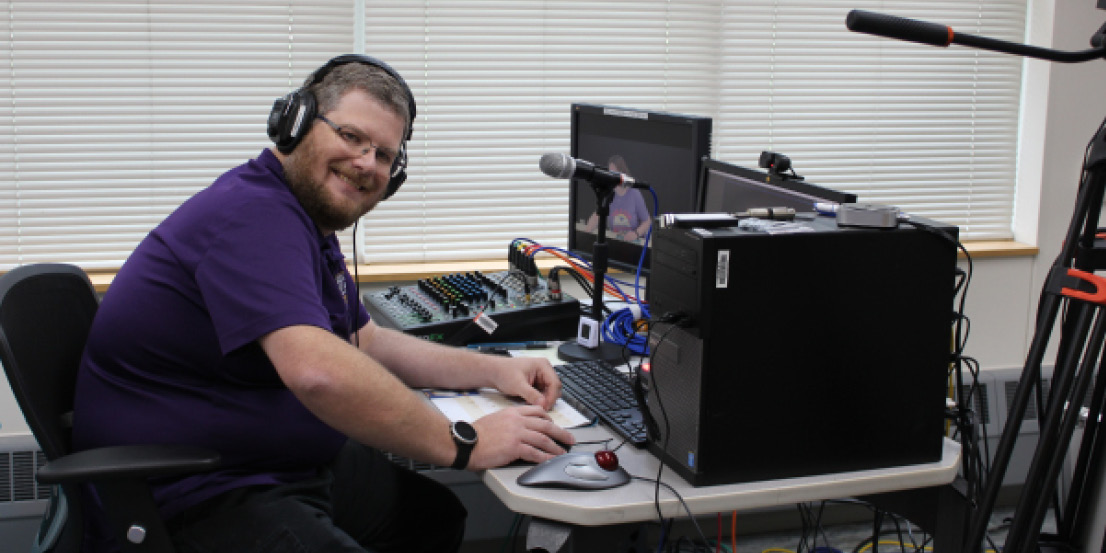 Librarian Shawn Walsh sits on the production side of online storytime. He can handle the technical side of interactive Zoom storytime while another librarian does what she does best.