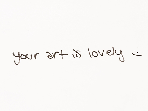 Figure 2. A note on the whiteboard wall: “Your art is lovely.”